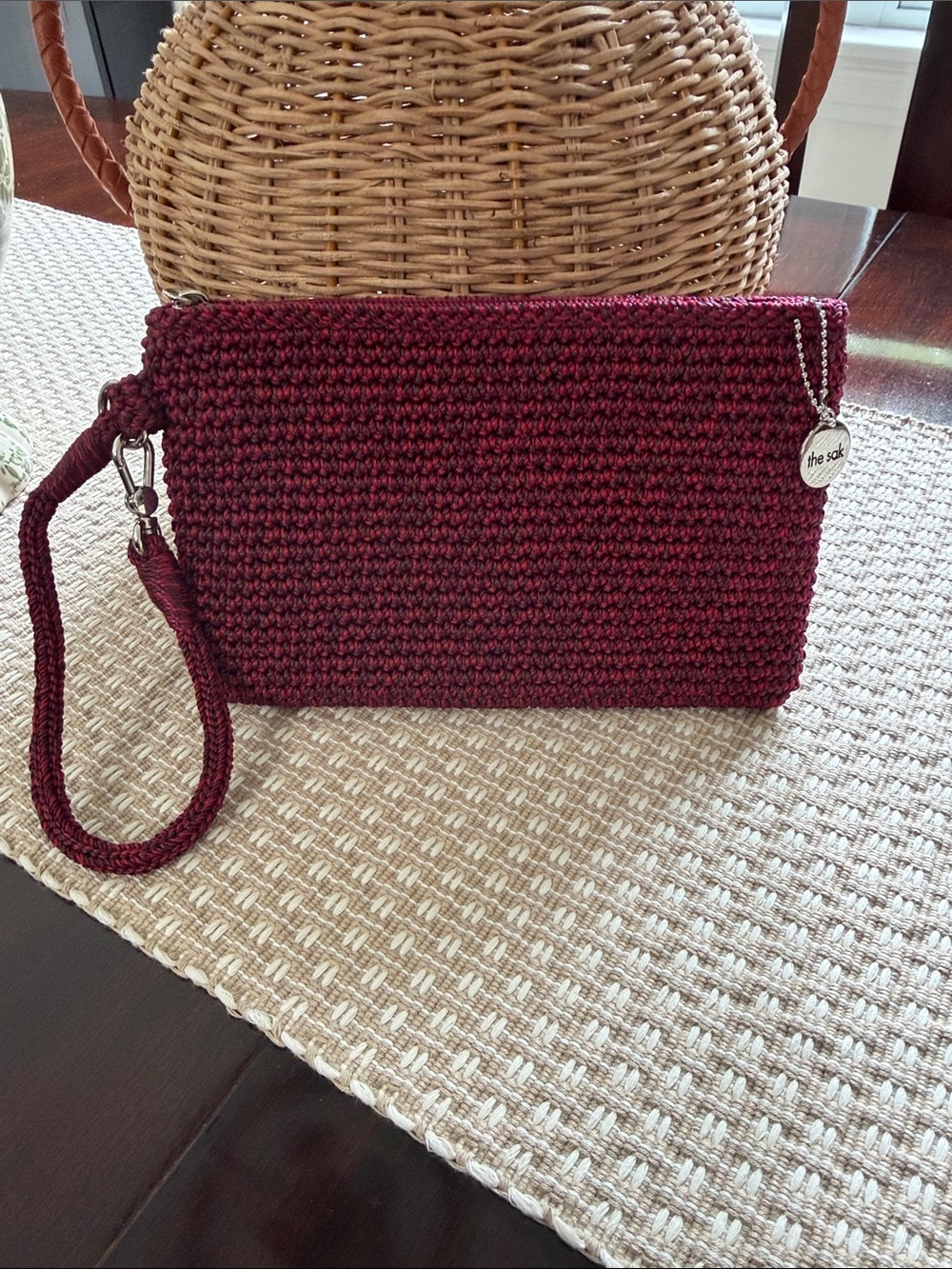 The Sak Burgundy Woven Wristlet with Logo Charm NWOT